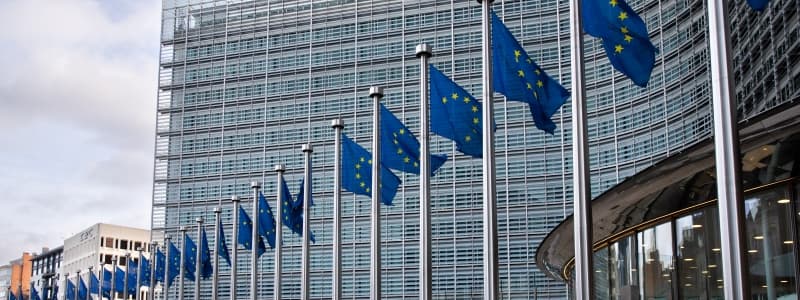 European flags in front of the European Commission headquarters.