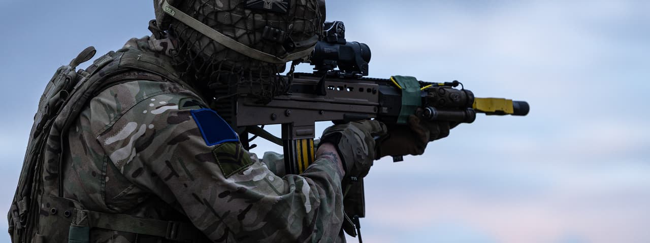 A British paratrooper aims an SA80 rifle during Exercise Cape Holder in the Falkland Islands. (UK MoD Crown Copyright 2026)