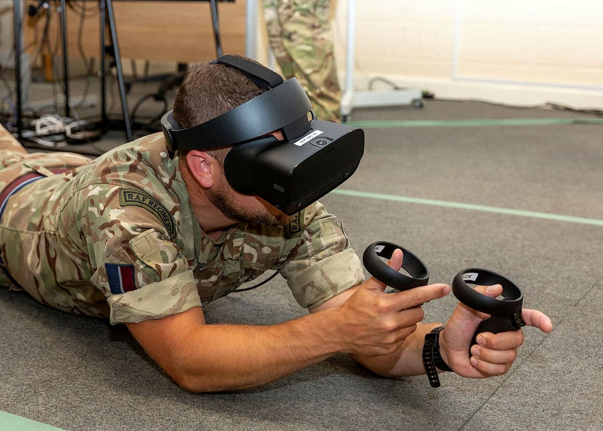 A RAF Regiment instructor in prone firing position trialing SimCentric’s SAF-TAC Virtual Reality software.