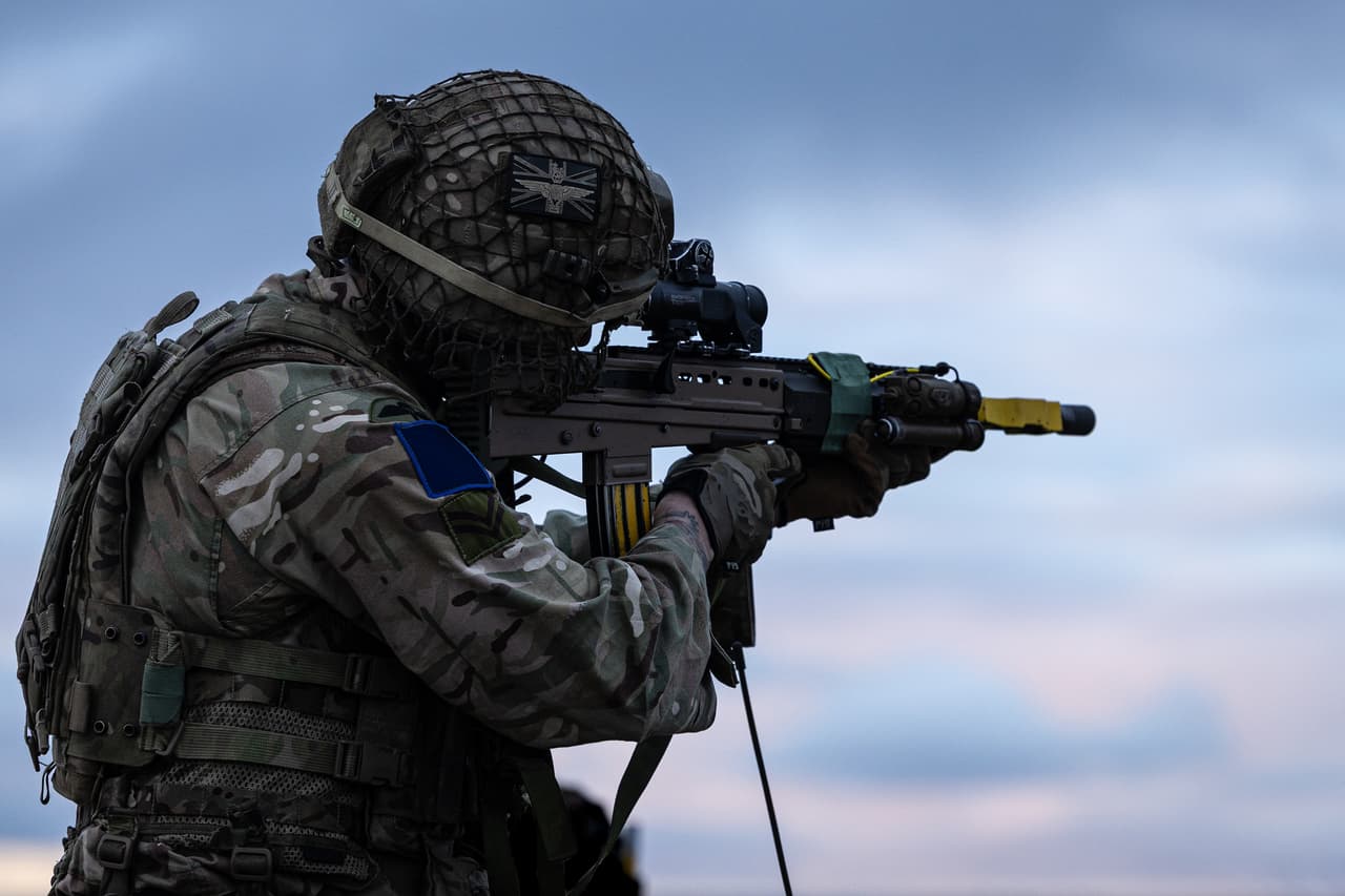 A British paratrooper aims an SA80 rifle during Exercise Cape Holder in the Falkland Islands. (UK MoD Crown Copyright 2026)