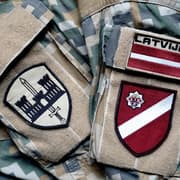 Latvian military badge on a soldier