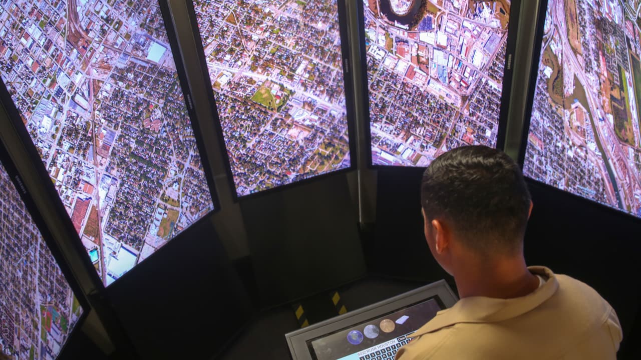 A soldier using a Google Earth simulator 